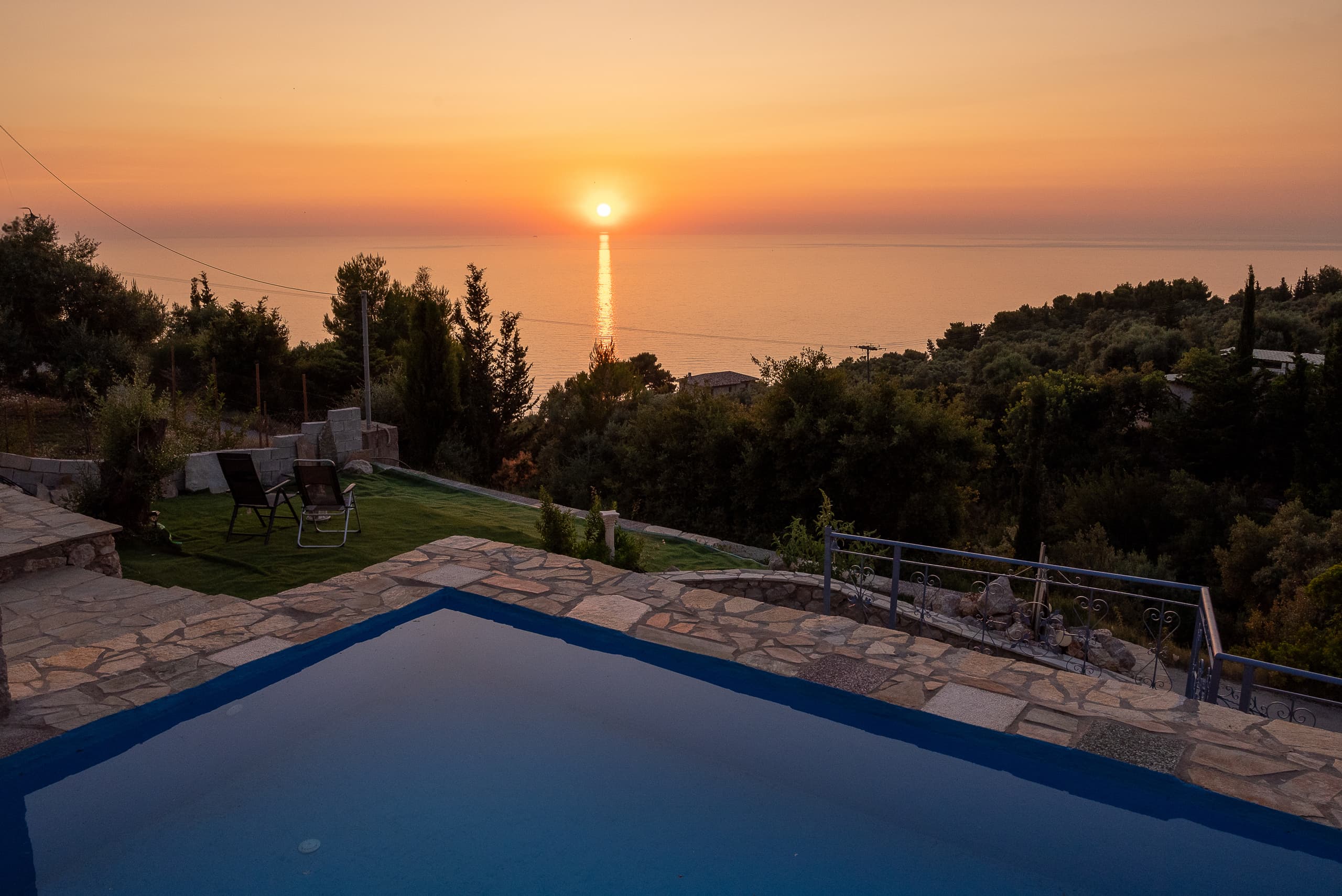 Pool terrace with views across the Lefkada landscape
